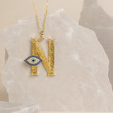 Initial Pendant with Evil Eye
